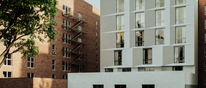 modern angular white facade of 2279 Barker Ave, Bronx, NYC